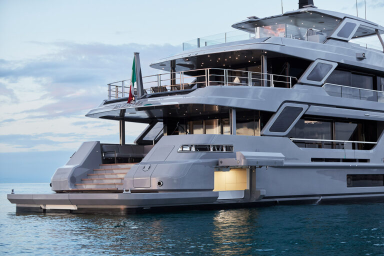 Pazienza superyacht rear quarter view at dusk